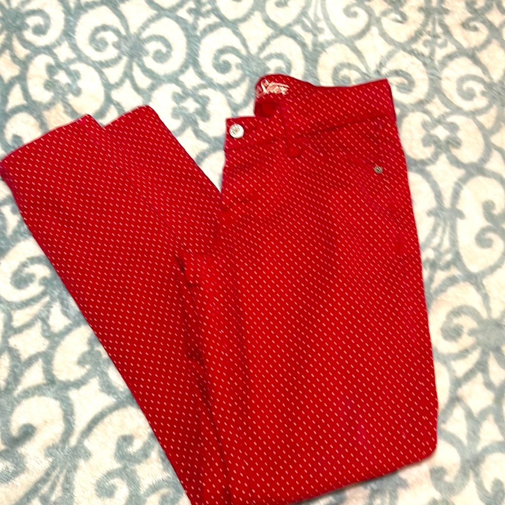 Red and white poka dot pants.
